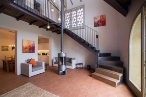 Lounge with wood-burning fireplace